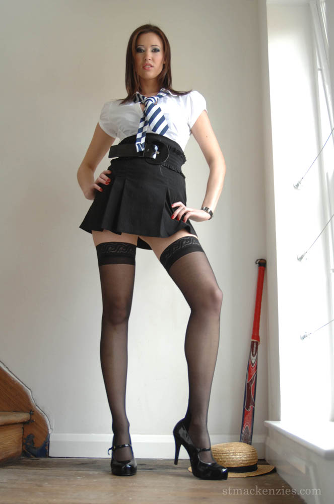 Carole Hunt in short school-skirt and stocking